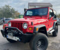 Червоний Джип Wrangler, об'ємом двигуна 2.5 л та пробігом 177 тис. км за 15500 $, фото 1 на Automoto.ua