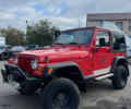Червоний Джип Wrangler, об'ємом двигуна 2.5 л та пробігом 177 тис. км за 15500 $, фото 3 на Automoto.ua