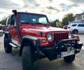 Червоний Джип Wrangler, об'ємом двигуна 2.5 л та пробігом 177 тис. км за 15500 $, фото 1 на Automoto.ua