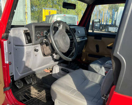 Красный Джип Вранглер, объемом двигателя 2.5 л и пробегом 177 тыс. км за 14999 $, фото 11 на Automoto.ua