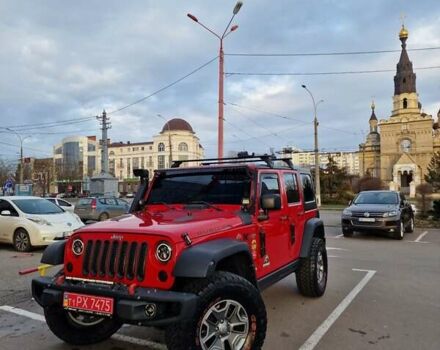 Червоний Джип Wrangler, об'ємом двигуна 2.77 л та пробігом 115 тис. км за 39000 $, фото 1 на Automoto.ua