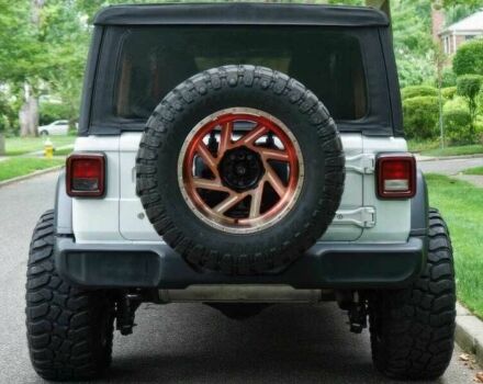 Красный Джип Вранглер, объемом двигателя 2 л и пробегом 57 тыс. км за 11000 $, фото 5 на Automoto.ua