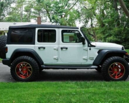 Красный Джип Вранглер, объемом двигателя 2 л и пробегом 57 тыс. км за 11000 $, фото 3 на Automoto.ua