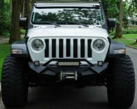 Красный Джип Вранглер, объемом двигателя 2 л и пробегом 57 тыс. км за 11000 $, фото 1 на Automoto.ua