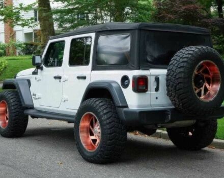 Красный Джип Вранглер, объемом двигателя 2 л и пробегом 57 тыс. км за 11000 $, фото 4 на Automoto.ua