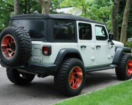 Красный Джип Вранглер, объемом двигателя 2 л и пробегом 57 тыс. км за 11000 $, фото 6 на Automoto.ua