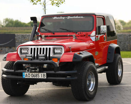 Червоний Джип Wrangler, об'ємом двигуна 4.2 л та пробігом 160 тис. км за 13499 $, фото 1 на Automoto.ua