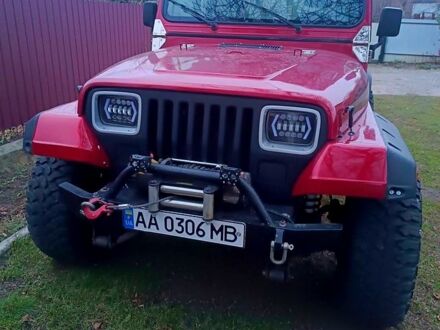 Красный Джип Вранглер, объемом двигателя 4 л и пробегом 200 тыс. км за 14500 $, фото 1 на Automoto.ua