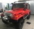 Червоний Джип Wrangler, об'ємом двигуна 4 л та пробігом 147 тис. км за 17500 $, фото 1 на Automoto.ua