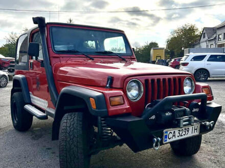 Джип Вранглер 1997 в Черкассах на Automoto.ua Красный Джип Вранглер, объемом двигателя 2.5 л и пробегом 177 тыс. км за 15500 $, фото 1 на Automoto.ua