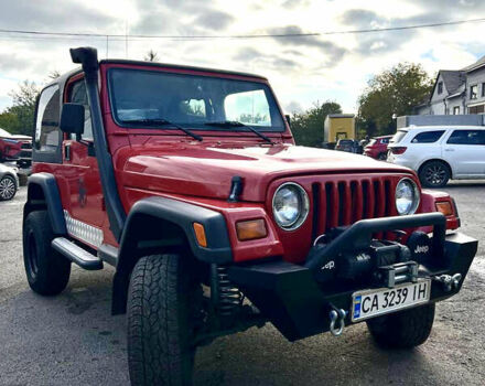 Красный Джип Вранглер, объемом двигателя 2.5 л и пробегом 177 тыс. км за 14999 $, фото 1 на Automoto.ua