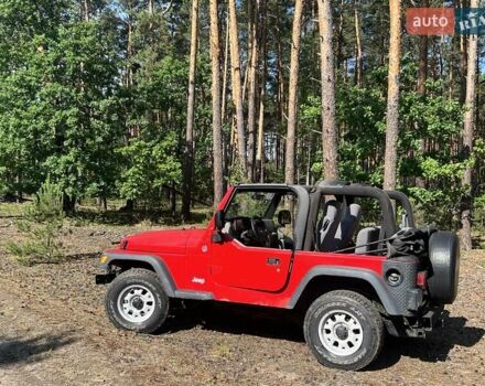 Червоний Джип Wrangler, об'ємом двигуна 2.43 л та пробігом 870 тис. км за 13000 $, фото 1 на Automoto.ua