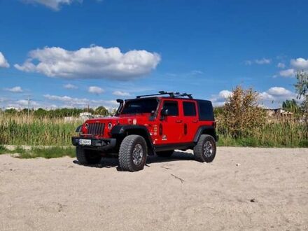 Червоний Джип Wrangler, об'ємом двигуна 2.77 л та пробігом 115 тис. км за 39000 $, фото 1 на Automoto.ua