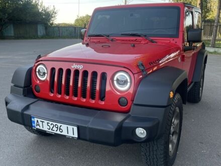 Красный Джип Вранглер, объемом двигателя 2.8 л и пробегом 100 тыс. км за 32999 $, фото 1 на Automoto.ua