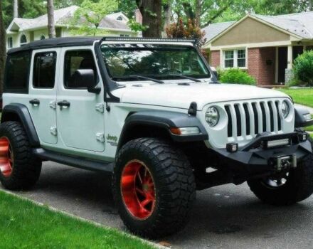 Красный Джип Вранглер, объемом двигателя 2 л и пробегом 57 тыс. км за 11000 $, фото 1 на Automoto.ua