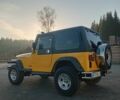 Желтый Джип Вранглер, объемом двигателя 2.5 л и пробегом 155 тыс. км за 8700 $, фото 4 на Automoto.ua