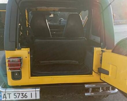 Желтый Джип Вранглер, объемом двигателя 2.5 л и пробегом 155 тыс. км за 8700 $, фото 7 на Automoto.ua