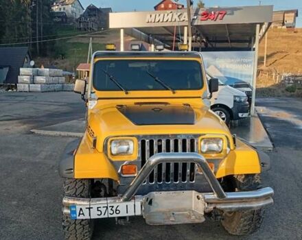 Желтый Джип Вранглер, объемом двигателя 2.5 л и пробегом 155 тыс. км за 8700 $, фото 1 на Automoto.ua