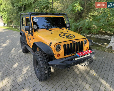 Желтый Джип Вранглер, объемом двигателя 3.6 л и пробегом 170 тыс. км за 23000 $, фото 13 на Automoto.ua