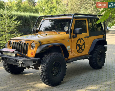 Желтый Джип Вранглер, объемом двигателя 3.6 л и пробегом 170 тыс. км за 23000 $, фото 1 на Automoto.ua