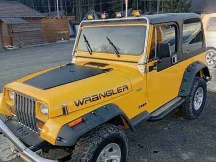 Желтый Джип Вранглер, объемом двигателя 2.5 л и пробегом 155 тыс. км за 8700 $, фото 1 на Automoto.ua