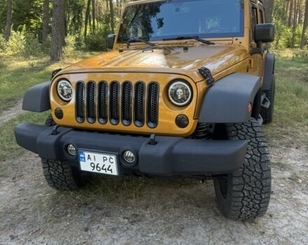 Желтый Джип Вранглер, объемом двигателя 3.6 л и пробегом 157 тыс. км за 23000 $, фото 1 на Automoto.ua