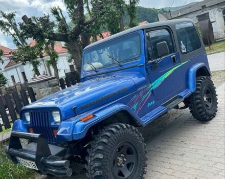 Синий Джип Вранглер, объемом двигателя 4 л и пробегом 167 тыс. км за 13500 $, фото 1 на Automoto.ua