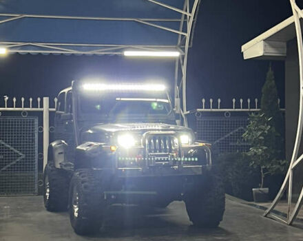 Зеленый Джип Вранглер, объемом двигателя 4 л и пробегом 90 тыс. км за 10500 $, фото 2 на Automoto.ua