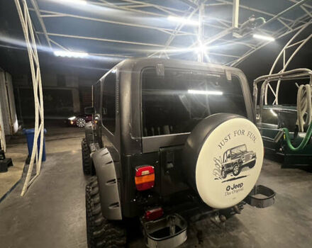 Зеленый Джип Вранглер, объемом двигателя 4 л и пробегом 90 тыс. км за 10500 $, фото 3 на Automoto.ua