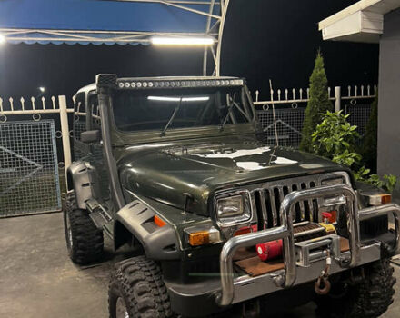 Зеленый Джип Вранглер, объемом двигателя 4 л и пробегом 90 тыс. км за 10500 $, фото 1 на Automoto.ua