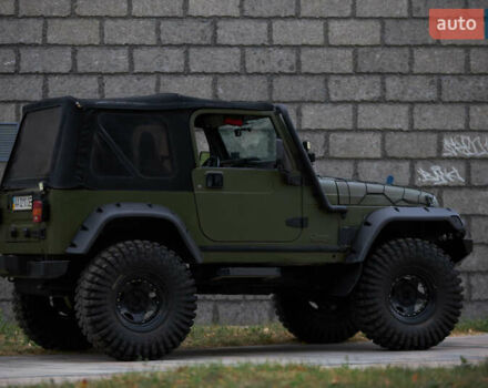 Зеленый Джип Вранглер, объемом двигателя 4 л и пробегом 177 тыс. км за 15900 $, фото 3 на Automoto.ua