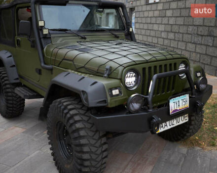 Зеленый Джип Вранглер, объемом двигателя 4 л и пробегом 177 тыс. км за 15900 $, фото 11 на Automoto.ua