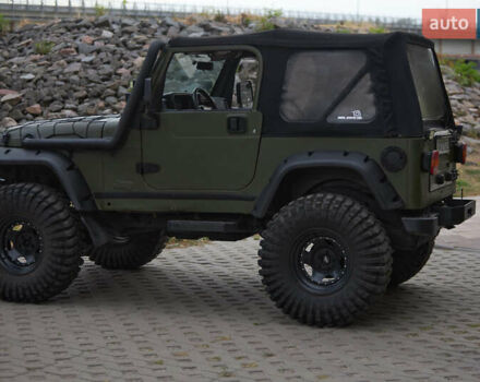 Зеленый Джип Вранглер, объемом двигателя 4 л и пробегом 177 тыс. км за 15900 $, фото 2 на Automoto.ua