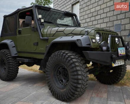 Зеленый Джип Вранглер, объемом двигателя 4 л и пробегом 177 тыс. км за 15900 $, фото 12 на Automoto.ua