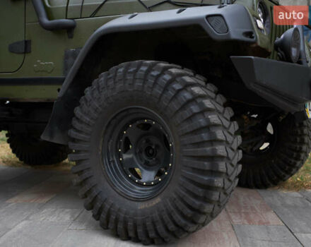 Зеленый Джип Вранглер, объемом двигателя 4 л и пробегом 177 тыс. км за 15900 $, фото 10 на Automoto.ua