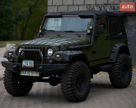 Зеленый Джип Вранглер, объемом двигателя 4 л и пробегом 177 тыс. км за 15900 $, фото 4 на Automoto.ua