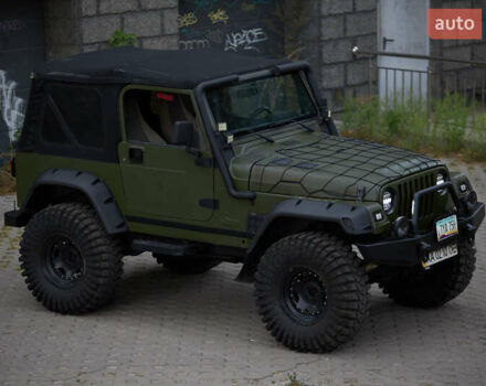 Зеленый Джип Вранглер, объемом двигателя 4 л и пробегом 177 тыс. км за 15900 $, фото 5 на Automoto.ua