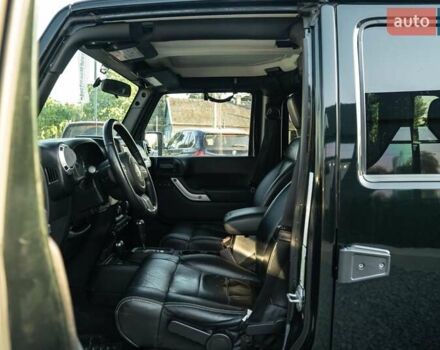 Зелений Джип Wrangler, об'ємом двигуна 2.78 л та пробігом 135 тис. км за 26900 $, фото 27 на Automoto.ua