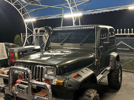 Джип Wrangler 1996 у Вінниці на Automoto.ua Зелений Джип Wrangler, об'ємом двигуна 4 л та пробігом 90 тис. км за 10500 $, фото 1 на Automoto.ua