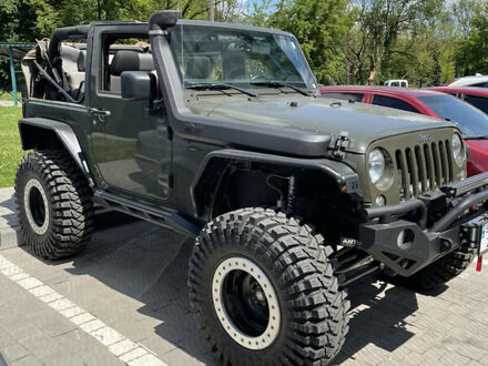 Джип Wrangler 2015 у Червонограде на Automoto.ua Зелений Джип Wrangler, об'ємом двигуна 3.6 л та пробігом 205 тис. км за 47500 $, фото 1 на Automoto.ua