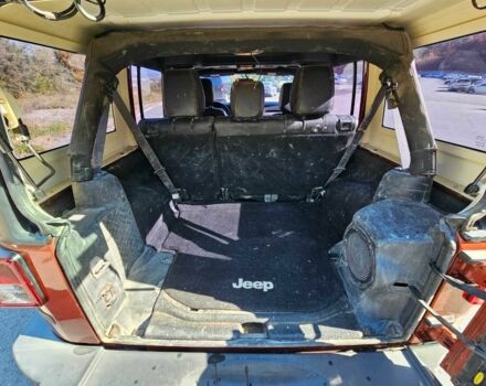 Оранжевый Джип Вранглер, объемом двигателя 2.7 л и пробегом 166 тыс. км за 6500 $, фото 4 на Automoto.ua