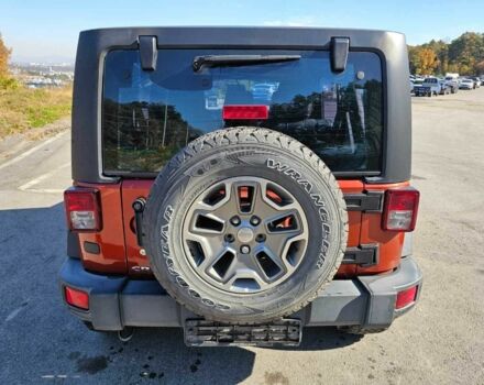 Оранжевый Джип Вранглер, объемом двигателя 2.7 л и пробегом 166 тыс. км за 6500 $, фото 3 на Automoto.ua