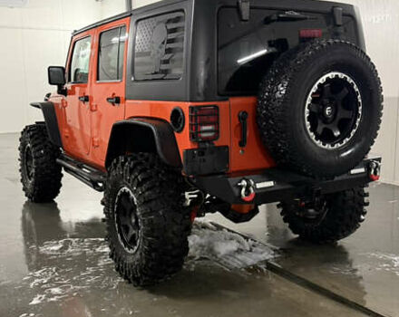 Оранжевый Джип Вранглер, объемом двигателя 3.6 л и пробегом 165 тыс. км за 26900 $, фото 4 на Automoto.ua