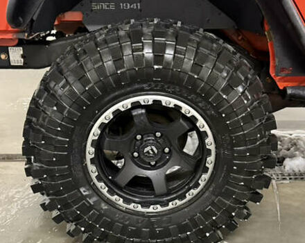 Оранжевый Джип Вранглер, объемом двигателя 3.6 л и пробегом 165 тыс. км за 26900 $, фото 5 на Automoto.ua