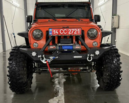 Оранжевый Джип Вранглер, объемом двигателя 3.6 л и пробегом 165 тыс. км за 26900 $, фото 1 на Automoto.ua