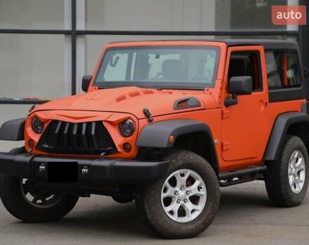 Помаранчевий Джип Wrangler, об'ємом двигуна 3.6 л та пробігом 120 тис. км за 15000 $, фото 1 на Automoto.ua