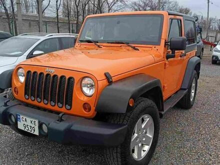 Джип Wrangler 2012 у Черкасах на Automoto.ua Помаранчевий Джип Wrangler, об'ємом двигуна 3.61 л та пробігом 169 тис. км за 17500 $, фото 1 на Automoto.ua