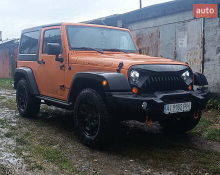 Помаранчевий Джип Wrangler, об'ємом двигуна 3.6 л та пробігом 191 тис. км за 22900 $, фото 1 на Automoto.ua