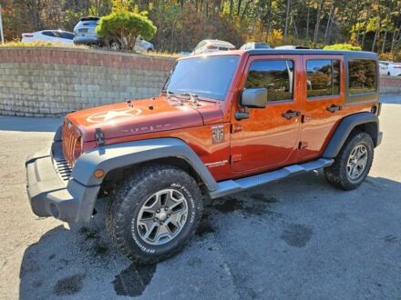 Оранжевый Джип Вранглер, объемом двигателя 2.7 л и пробегом 166 тыс. км за 6500 $, фото 1 на Automoto.ua