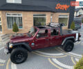 Красный Джип Gladiator, объемом двигателя 3.6 л и пробегом 72 тыс. км за 58000 $, фото 1 на Automoto.ua